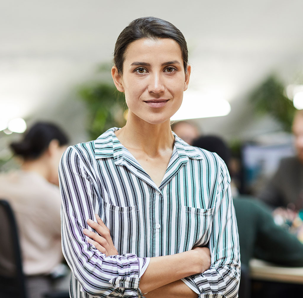 contemporary businesswoman posing in office
