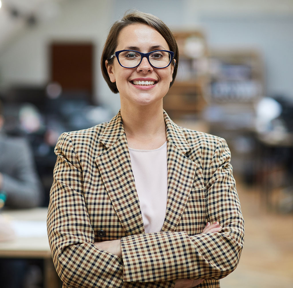 successful businesswoman posing in office